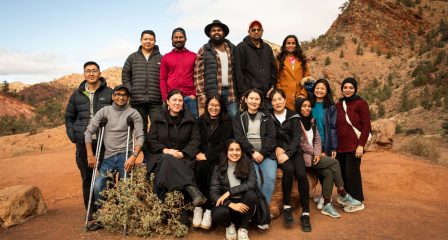 Muthu (back row, third from right) with the other participating scholars.