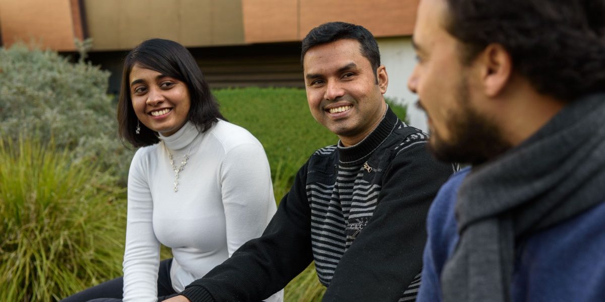Australia Global Alumni members networking and building professional connections during an outdoor discussion