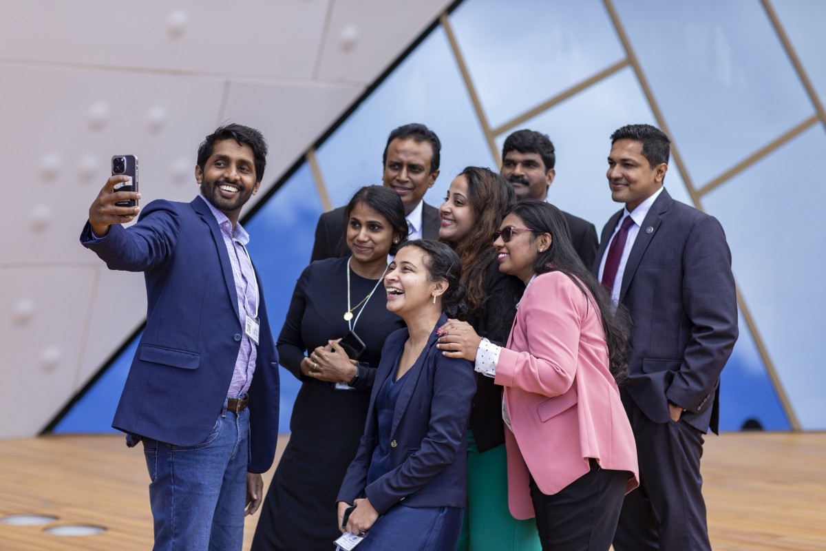 Australia Awards scholars taking a group selfie