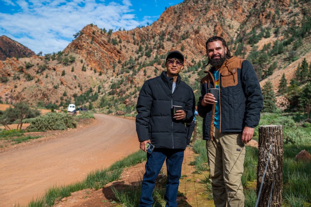 Aki pictured with John (right) during their tour at the Ikara-Flinders Ranges National Park.