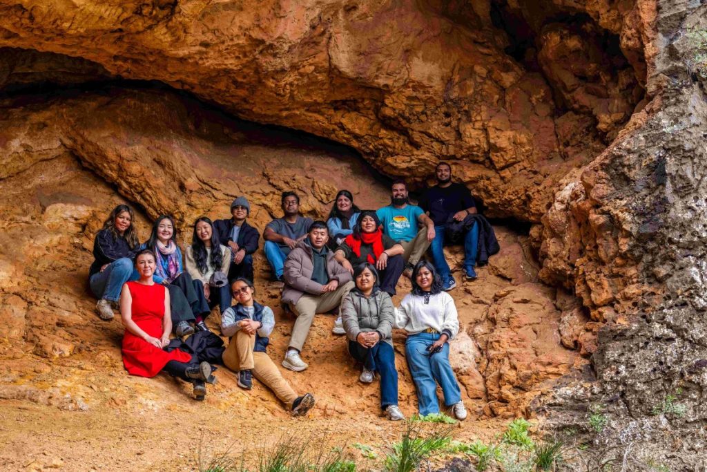 Nahid (right, front row) pictured with all scholars, Alice (in red dress) and John (second from right, back row) at the at the Ikara-Flinders Ranges National Park.