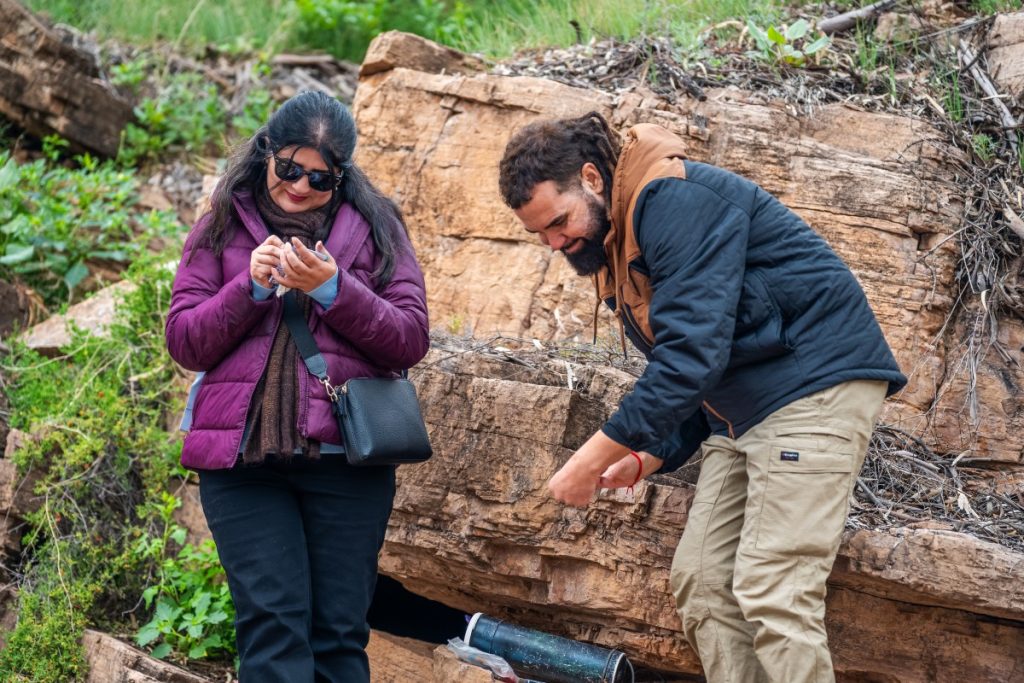Shamsa (left) interacting with guide John (right) during the study tour.