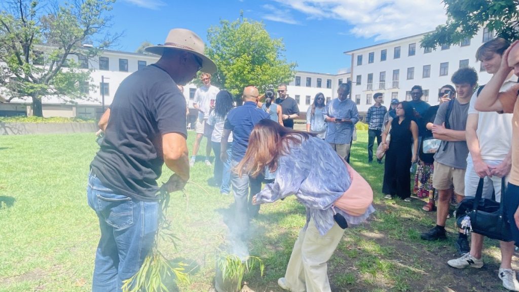 The beginning of the Smoking Ceremony held on the ANU CLGP lawns.